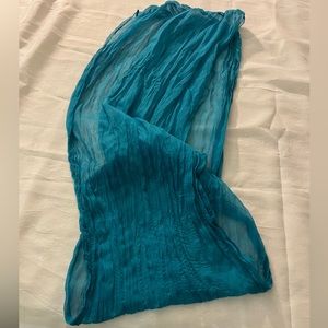 Pretty turquoise infinity crinkle scarf.